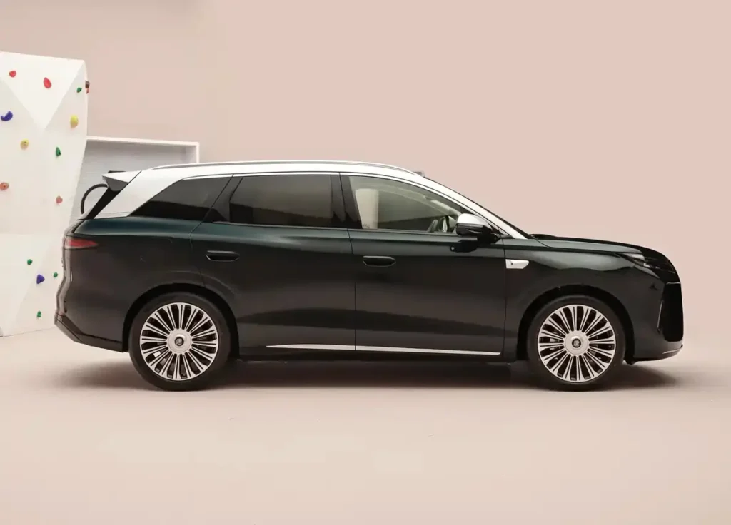 All-new BYD Tang EV black SUV, full side profile studio photo