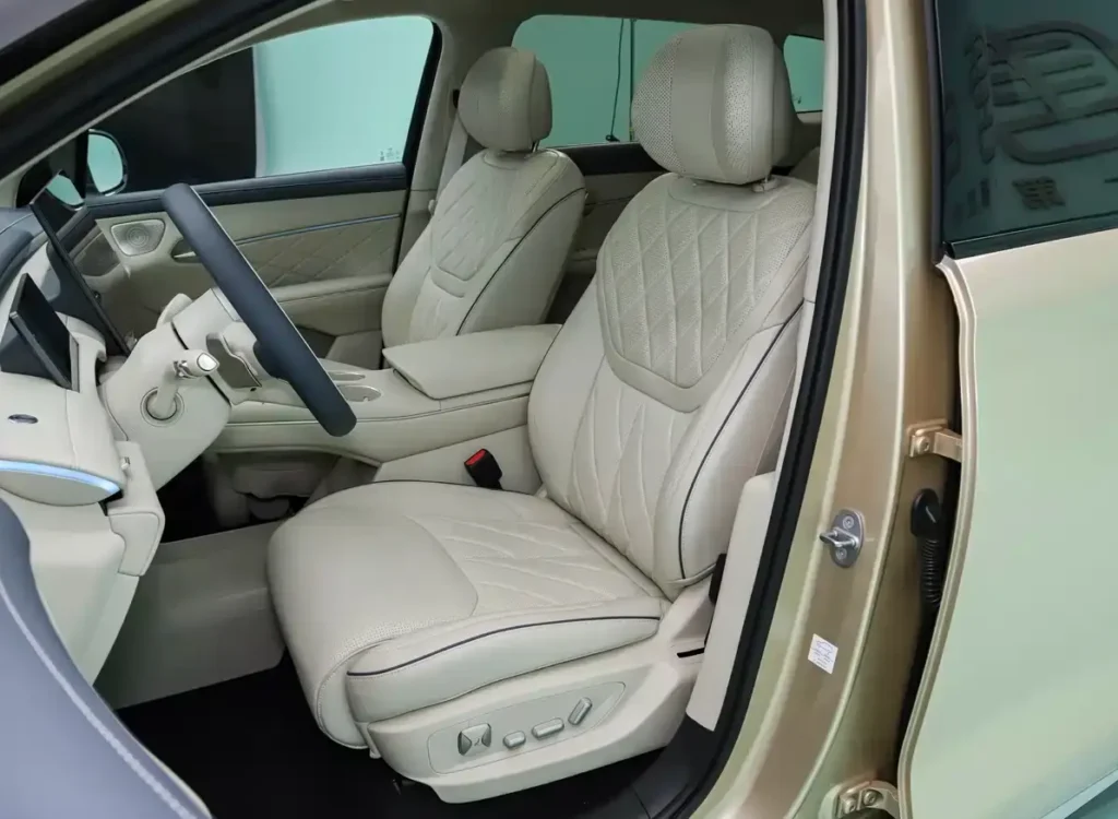 All-new BYD Tang EV front beige quilted leather seats, interior side view