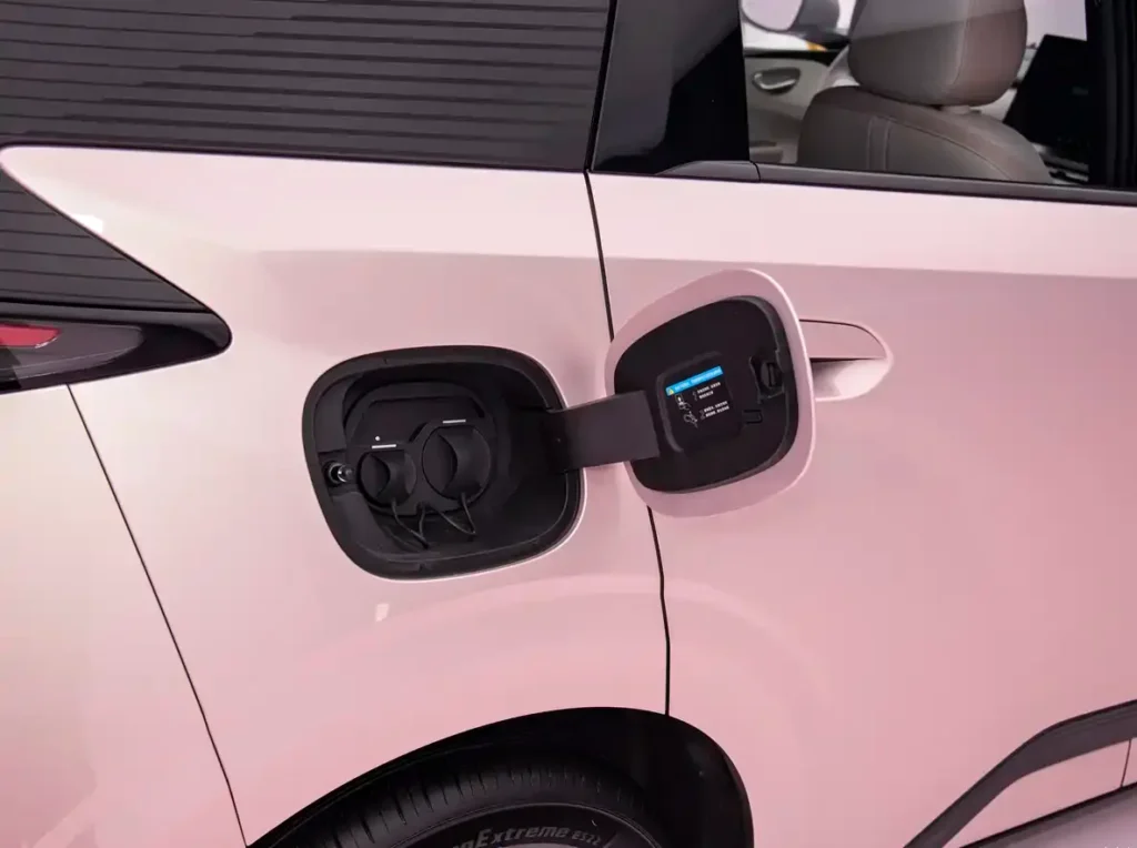 Pink BYD Second-Generation Seagull electric hatchback, charging port close-up view